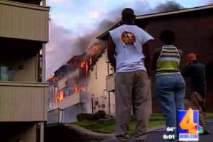 Man rescues his dog from building fire.