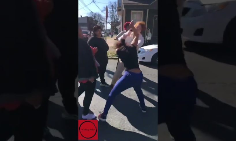 Hood fights mother and family watch on as girl gets punched on