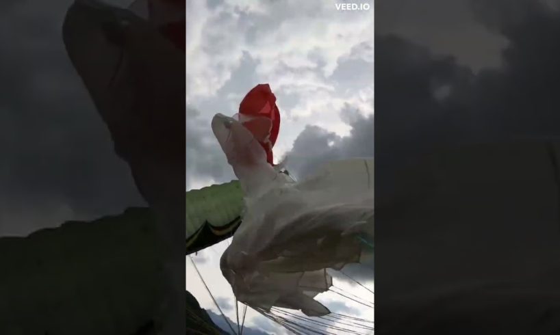 Spiraling Paraglider Impacts The Ground Unscathed