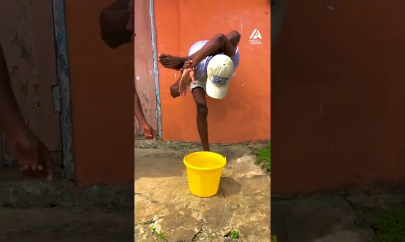 Contortionist Shows Flexibility While Picking Up Bucket | People Are Awesome #contortion #shorts