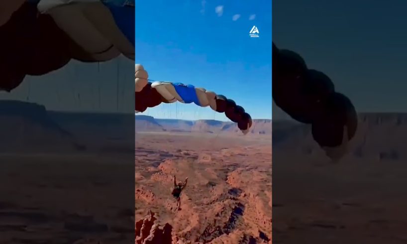 Man Jumps Off Cliff Then Glides Over Desert | People Are Awesome #shorts