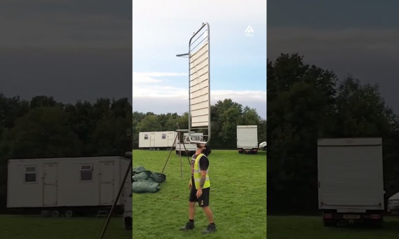 Guy Balances Huge Iron Stand on His Chin | People Are Awesome