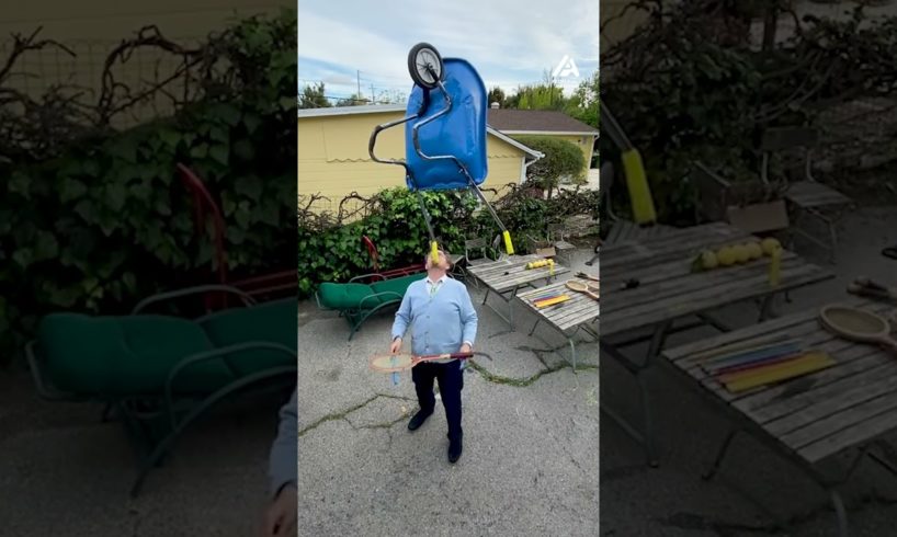 Man Balances Wheelbarrow on Chin and While Juggling | People Are Awesome #shorts