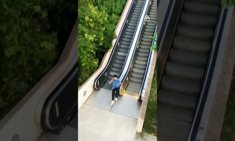 Guy Slides Down Escalator Railing | People Are Awesome