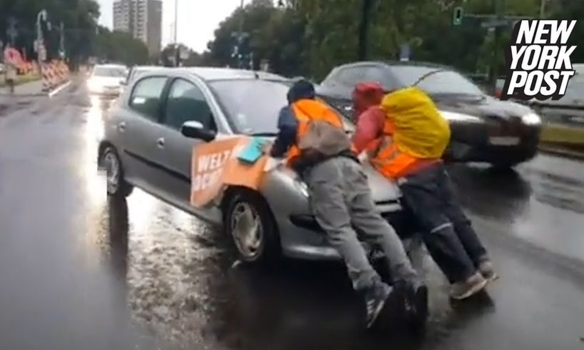 Irate drivers ram into climate protesters blocking traffic, drag them hundreds of feet down highway