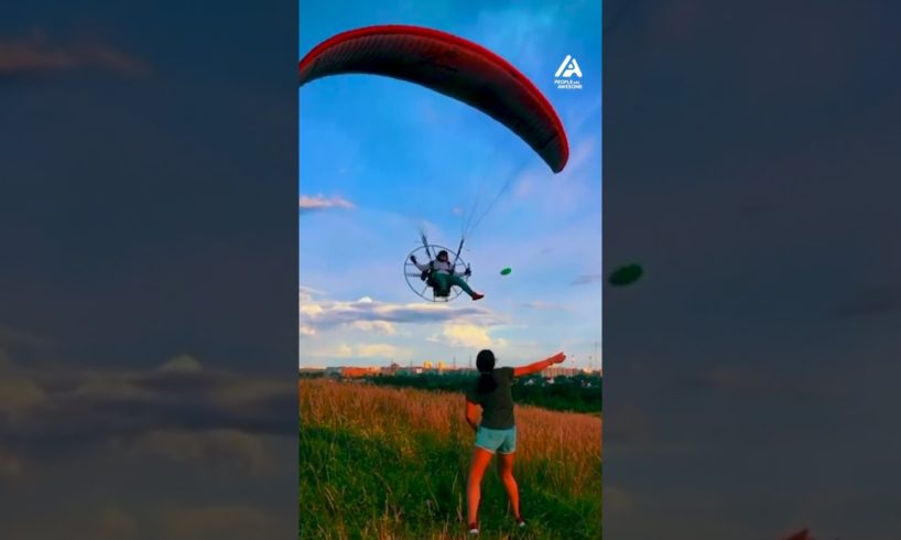 Guy Catches Frisbee With Feet While Flying Paramotor | People Are Awesome #shorts