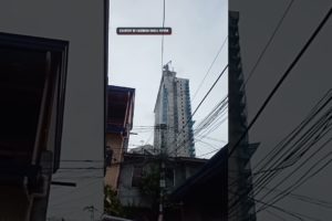 Earthquake makes debris, part of a crane fall from a building in Matina, Davao City