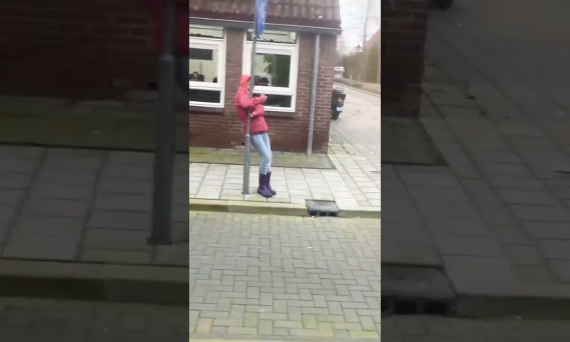 People on Skateboards Use Plastic bag and Strong Winds to Ride