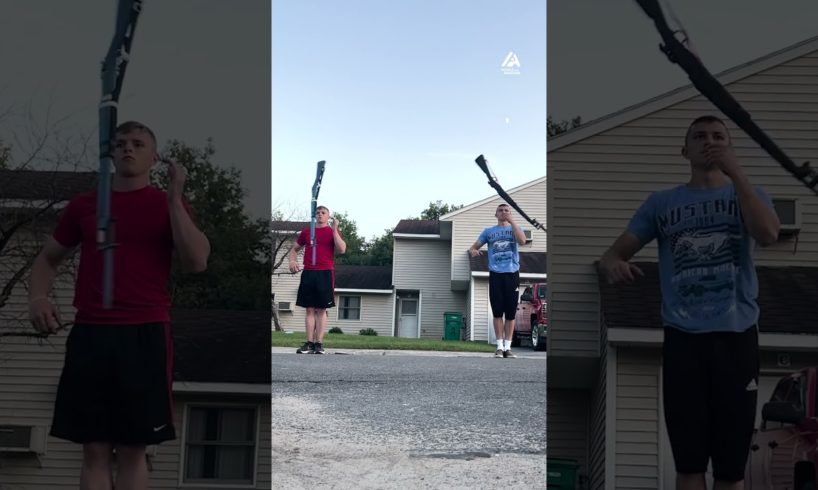 Duo Swings Rifles in Sync During Practice Drill