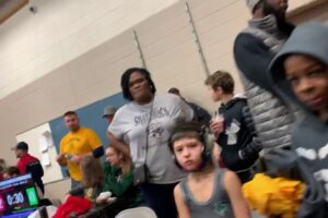 Wrestling racism white mom attacks black 7yr old kid (nothing happens)