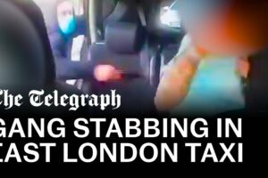 Terrifying moment man is stabbed by knife-wielding gang in the back of a taxi