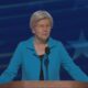 Elizabeth Warren fights back tears at DNC during a minutes-long standing ovation