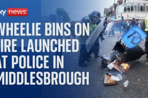 UK riots: Wheelie bins on fire launched at police in Middlesbrough