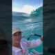 Huge surge wave nearly takes boats and people with it!