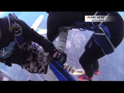 Caught on cam: Skydivers survive fiery mid-air plane crash