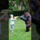 Gorillas and babies play with water guns. #cute #gorilla #animals#baby#shorts#funny#love