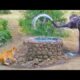 Elephant Sprays Water at Lion