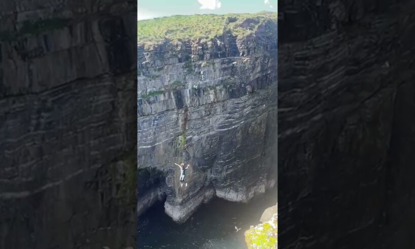 Lad lands on a bird after jumping off big cliff in Scotland