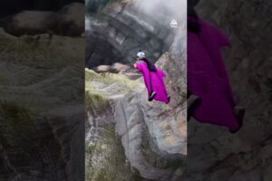 Wingsuit Jump Through Mountain Pass | People Are Awesome